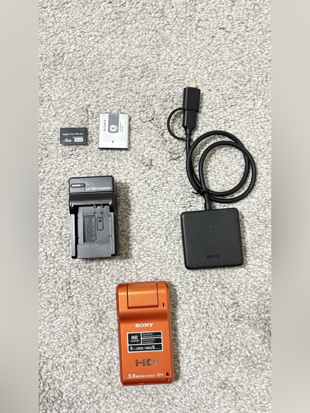 Bundled Sony MHS-PM1 Webbie HD Camcorder in Orange TESTED AND WORKS